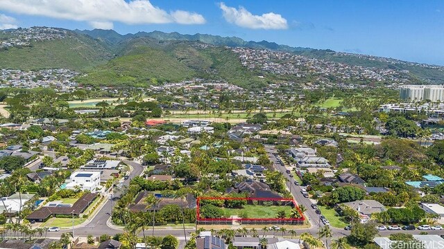 4804 Aukai Ave, Honolulu, HI 96816 - aerial view of residential area with property boundaries highlighted and a mountain backdrop