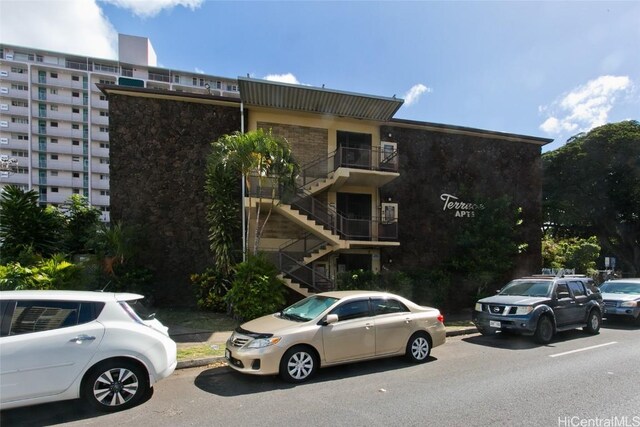 view of property with stairs