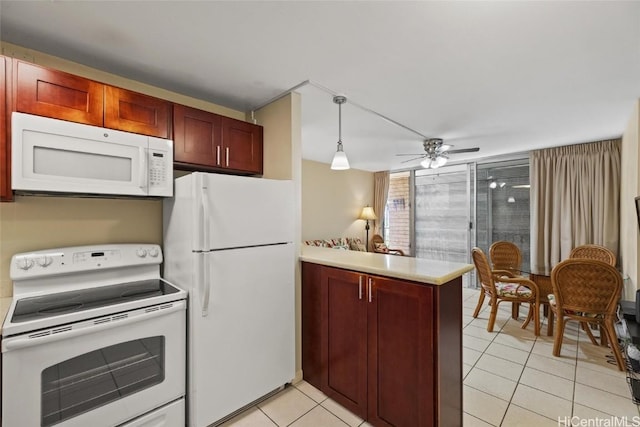 kitchen featuring pendant lighting, white appliances, a peninsula, light tile patterned floors, and ceiling fan