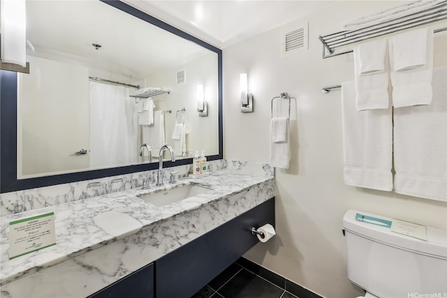 410 Atkinson Dr Unit 1609, Honolulu, HI 96814 - bathroom featuring tile patterned flooring, toilet, vanity, baseboards, and a shower with curtain
