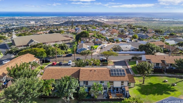 birds eye view of property with a residential view