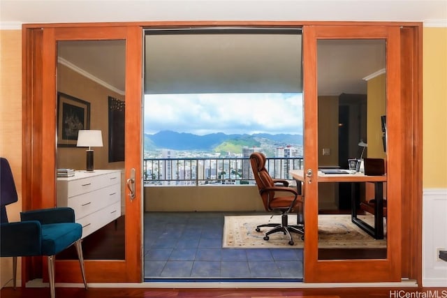 tiled office space featuring a mountain view and ornamental molding