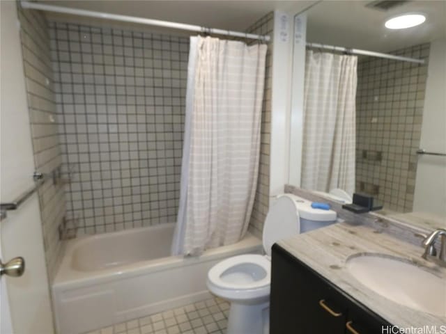 bathroom featuring vanity, shower / tub combo, toilet, and tile patterned flooring