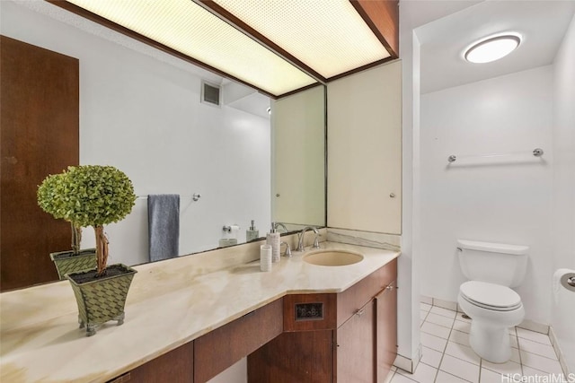 bathroom featuring tile patterned floors, visible vents, toilet, and vanity