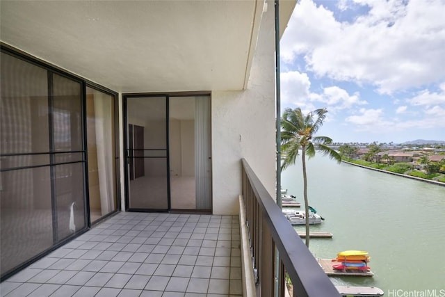 balcony featuring a water view