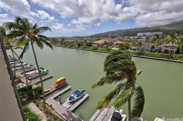 property view of water featuring a boat dock