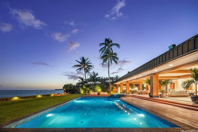 4505 Kahala Ave, Honolulu, HI 96816 - view of pool featuring a yard, a patio area, an outdoor hangout area, a water view, and a pool with connected hot tub