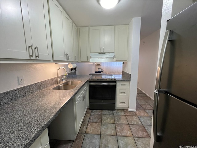 46-232 Kahuhipa St Unit B207, Kaneohe, HI 96744 - kitchen featuring appliances with stainless steel finishes, a sink, under cabinet range hood, white cabinetry, and dark stone countertops