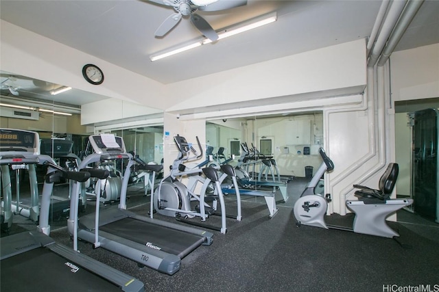 exercise room with ceiling fan