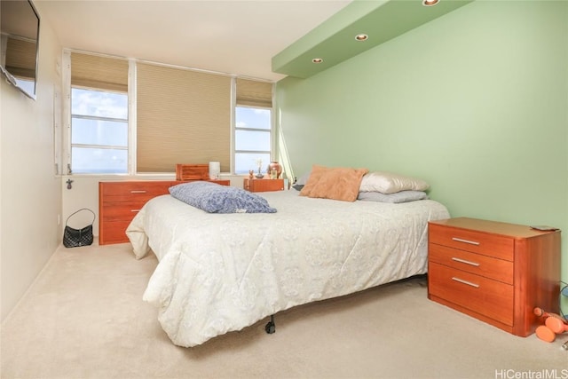 bedroom with recessed lighting and carpet floors