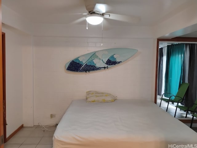 bedroom featuring light tile patterned floors and ceiling fan