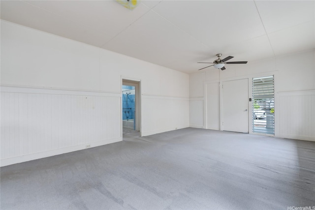 2712 Pulena Pl, Honolulu, HI 96822 - carpeted spare room featuring ceiling fan and a wainscoted wall