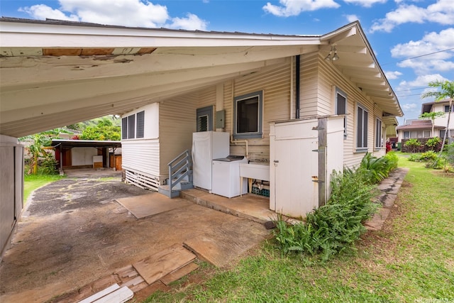 2712 Pulena Pl, Honolulu, HI 96822 - view of front of home with an attached carport and electric panel