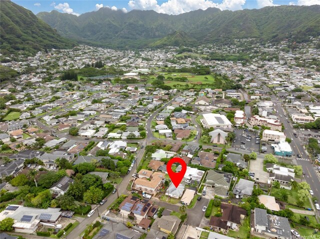 2712 Pulena Pl, Honolulu, HI 96822 - aerial overview of property's location featuring a mountainous background and nearby suburban area