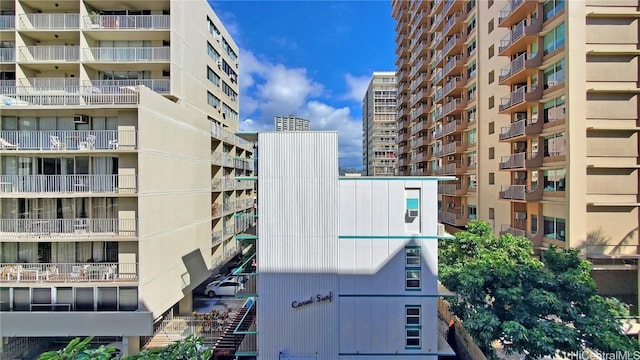 view of building exterior featuring a view of city