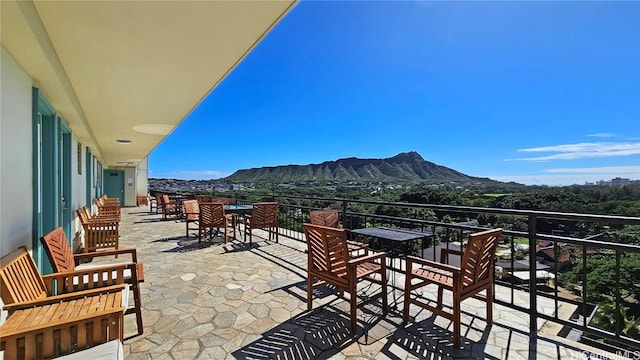 balcony featuring a mountain view