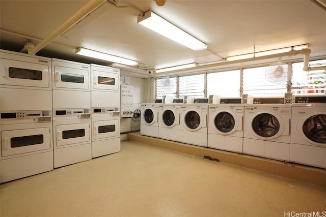 community laundry room with stacked washer / dryer and independent washer and dryer