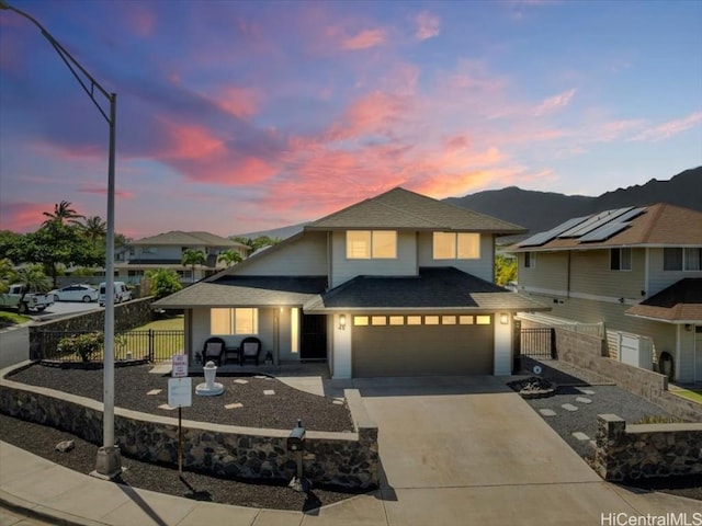 48 Kuuhale Pl, Kahului, HI 96732 - view of front of home featuring a shingled roof, an attached garage, concrete driveway, and fence