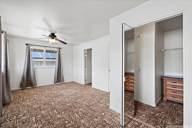 48 Kuuhale Pl, Kahului, HI 96732 - unfurnished bedroom with carpet flooring, baseboards, a closet, and ceiling fan
