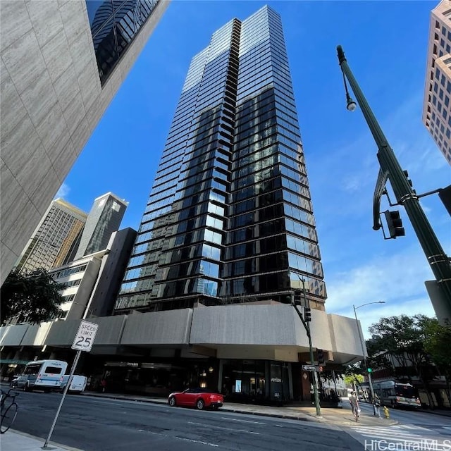 view of building exterior featuring a city view