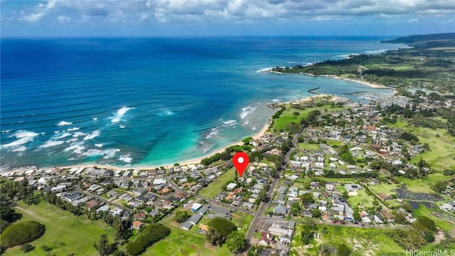 drone / aerial view featuring a water view and a residential view