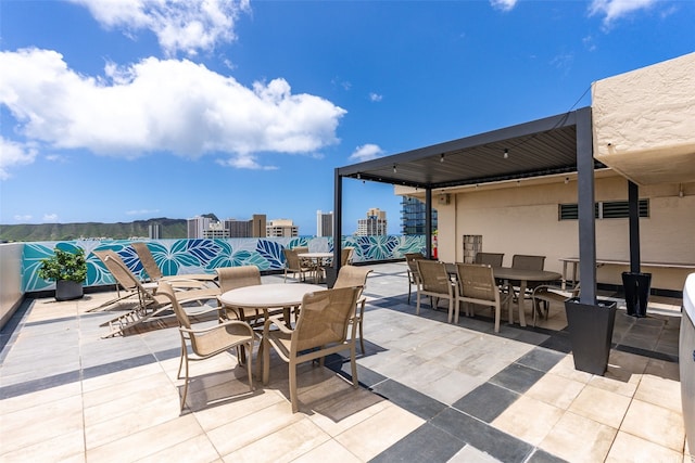 2345 Ala Wai Blvd Unit 1003, Honolulu, HI 96815 - view of patio / terrace featuring outdoor dining area and a city view