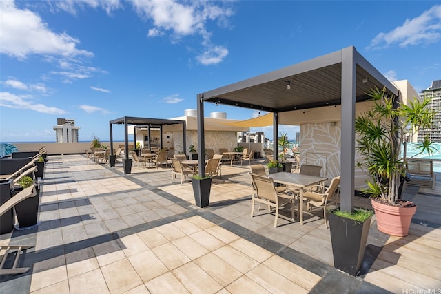 2345 Ala Wai Blvd Unit 1003, Honolulu, HI 96815 - view of patio featuring outdoor dining space