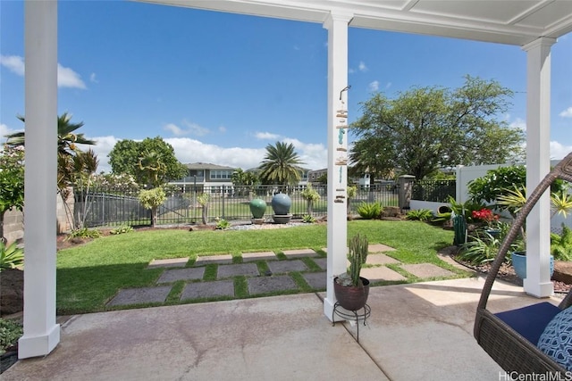 view of patio featuring fence