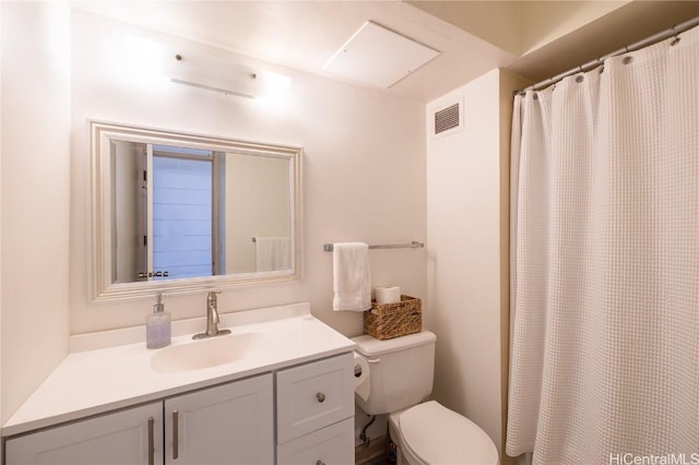 full bathroom with visible vents, toilet, and vanity