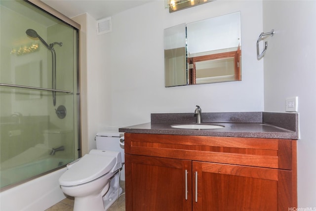 1350 Ala Moana Blvd Unit 3012, Honolulu, HI 96814 - bathroom featuring vanity, toilet, and combined bath / shower with glass door