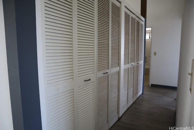 hallway with wood finished floors