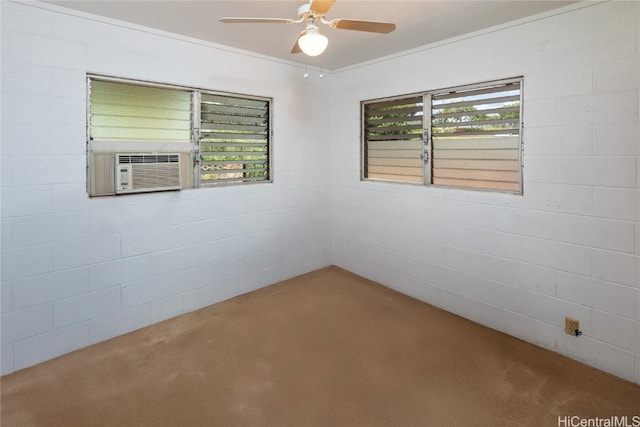 unfurnished room featuring cooling unit and a ceiling fan