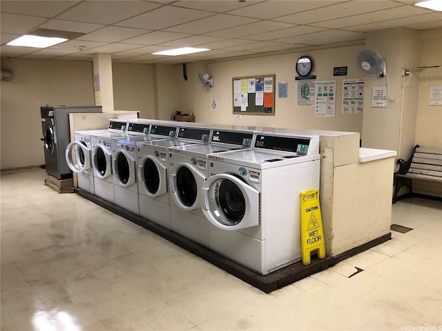 1519 Nuuanu Ave Unit 142, Honolulu, HI 96817 - shared laundry area featuring light floors and independent washer and dryer