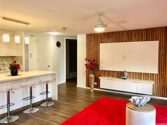 1519 Nuuanu Ave Unit 142, Honolulu, HI 96817 - living area featuring a ceiling fan, baseboards, and dark wood-style flooring