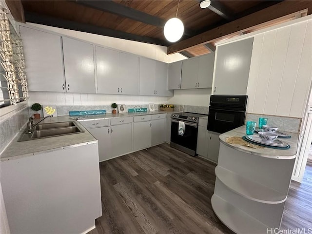 kitchen with dark wood-type flooring, electric stove, a sink, black oven, and wood ceiling