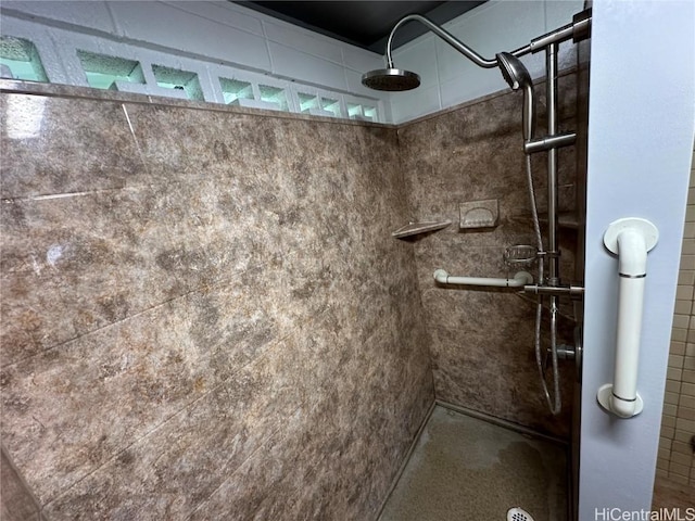 full bath featuring a tile shower