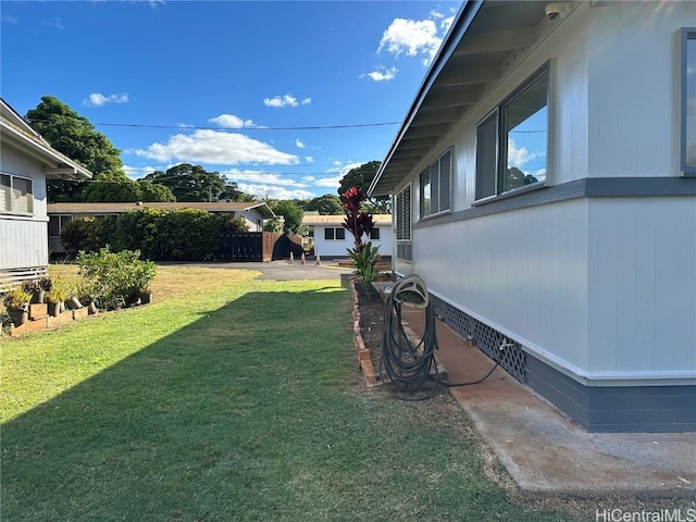 view of yard with fence