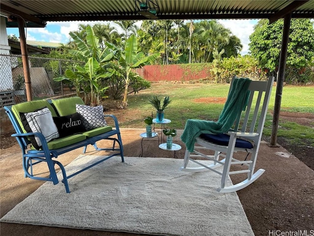 view of patio featuring fence