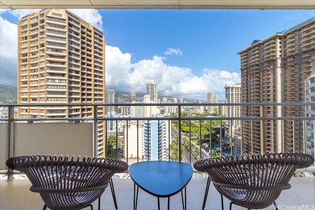 balcony featuring a view of city