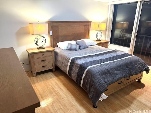 bedroom featuring light wood-type flooring