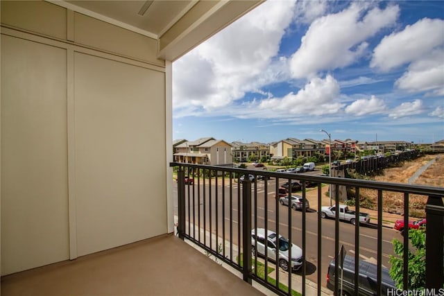 balcony featuring a residential view