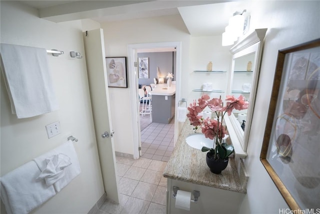 bathroom featuring tile patterned floors and vanity