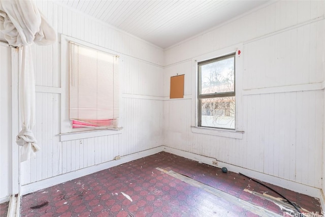 spare room with tile patterned floors