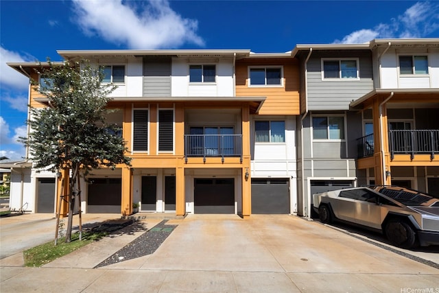 91-3575 Kauluakoko St Unit 1610, Ewa Beach, HI 96706 - view of property featuring a garage and driveway
