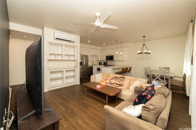 91-3575 Kauluakoko St Unit 1610, Ewa Beach, HI 96706 - living room with a wall mounted AC, a chandelier, dark wood-type flooring, and a ceiling fan