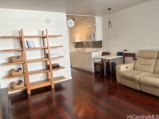 living area with dark wood-style floors