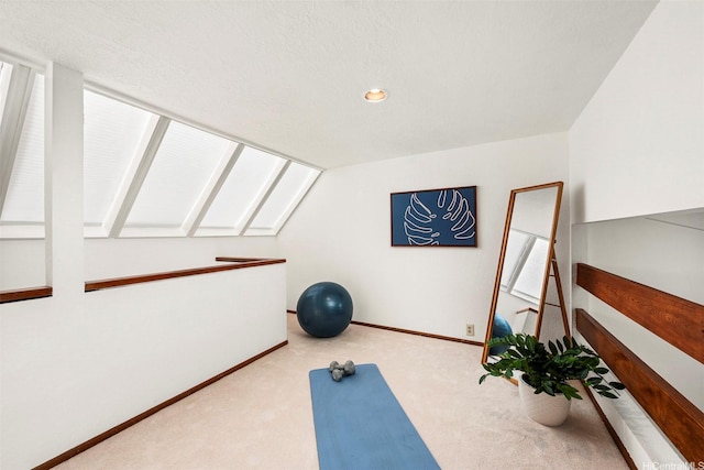 145 Maono Pl, Honolulu, HI 96821 - exercise room featuring baseboards, lofted ceiling with skylight, recessed lighting, and carpet