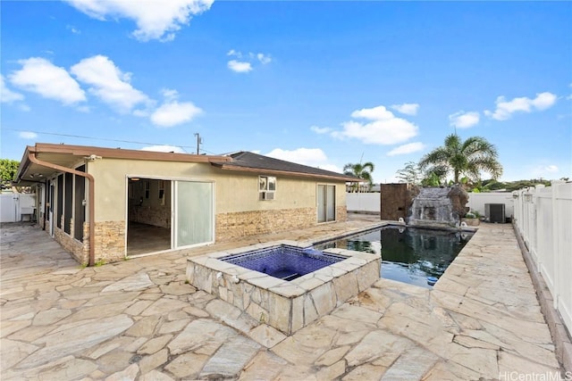 view of swimming pool featuring a fenced in pool, a fenced backyard, and a patio area