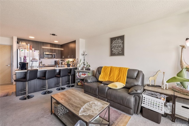 615 Keawe St Unit 1905, Honolulu, HI 96813 - living area featuring a textured ceiling, light carpet, and recessed lighting