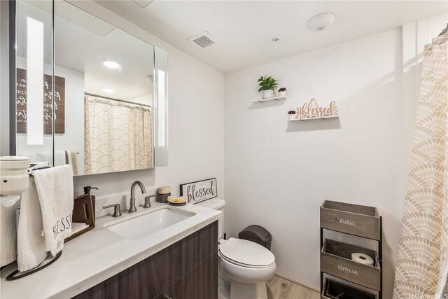 615 Keawe St Unit 1905, Honolulu, HI 96813 - full bath featuring wood finished floors and vanity